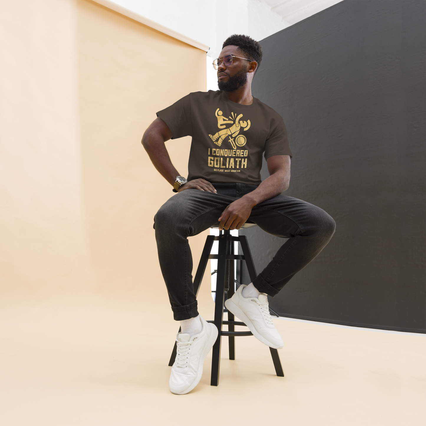 guy wearing I Conquered Goliath Ride Tee